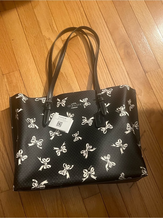 Coach Handbags - Coach Black Tote with White Bow Print